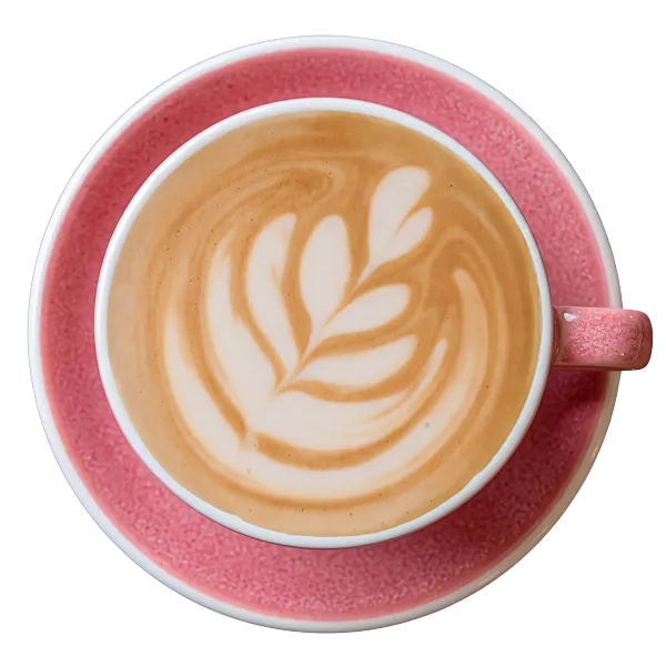Pinke Cappuccinotasse mit Latte Art, von oben fotografiert